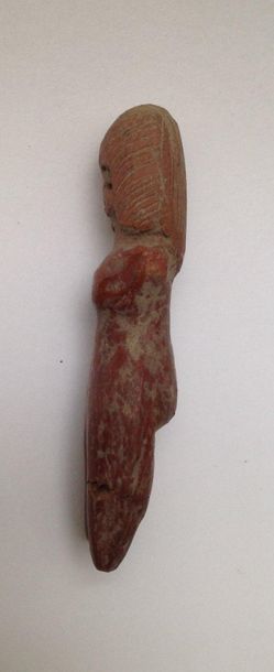 Female terracotta figurine with finely incised...