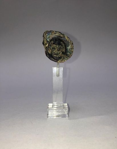 Theater mask: fragment of the base of a glass...