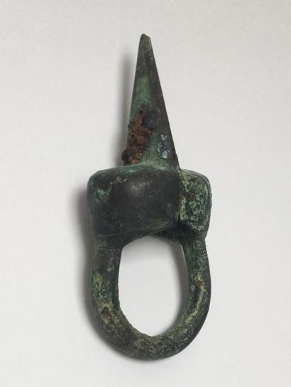 Bronze ring with a patina of excavation.

Buckle...