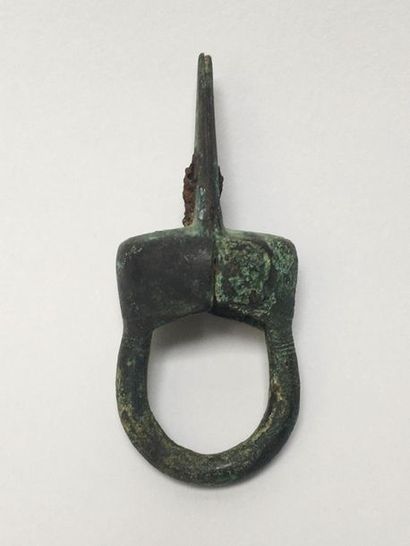 Bronze ring with a patina of excavation.

Buckle...