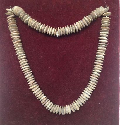 Necklace made of cut flint discs.

Bactrian,...
