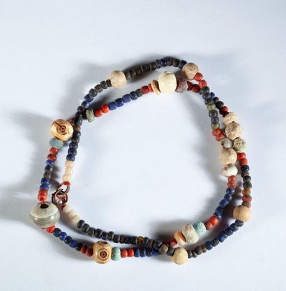 Necklace of glass beads, earthenware and...