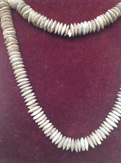 Necklace made of cut flint discs.

Bactrian,...