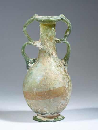 Iridescent glass bottle with four handles...