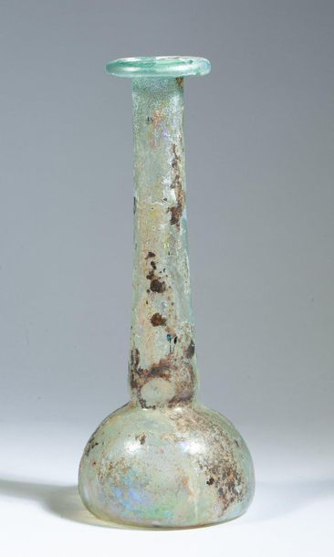 Flat-bottomed bottle in translucent iridescent...