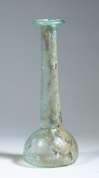Flat-bottomed bottle in translucent iridescent...