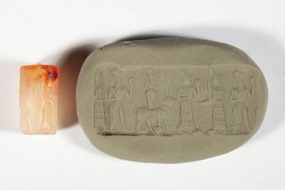 Agate cylinder seal decorated with standing...