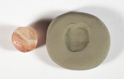 Intaglio agate stamp with inscriptions.

Late...