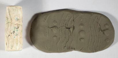 Shell cylinder seal decorated with wavy incisions...
