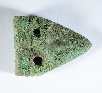 Fenestrated bronze axe with a slightly crusting...