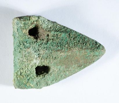 Fenestrated bronze axe with a slightly crusting...