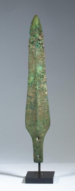 Bronze arrowhead with green patina.

Canaan,...