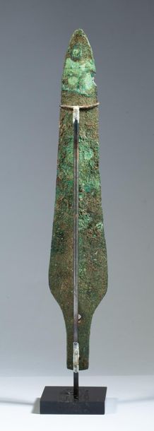 Bronze arrowhead with green patina.

Canaan,...