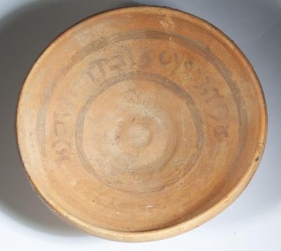Beige terracotta soup plate with traces of...