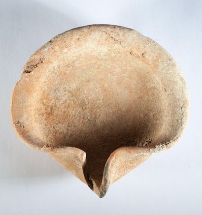 Beige terracotta oil lamp with pinched beak...