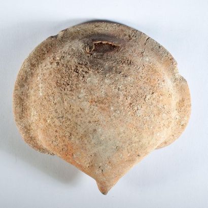 Beige terracotta oil lamp with pinched beak...