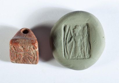Stamp in veined red marble engraved with...