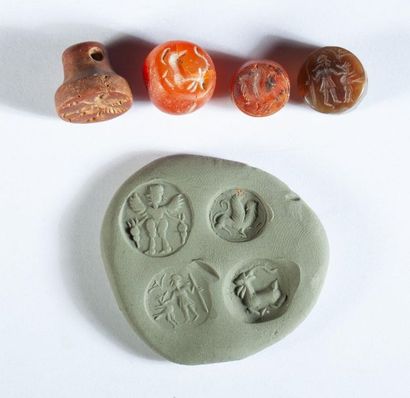 Four antique carnelian stamps probably engraved...