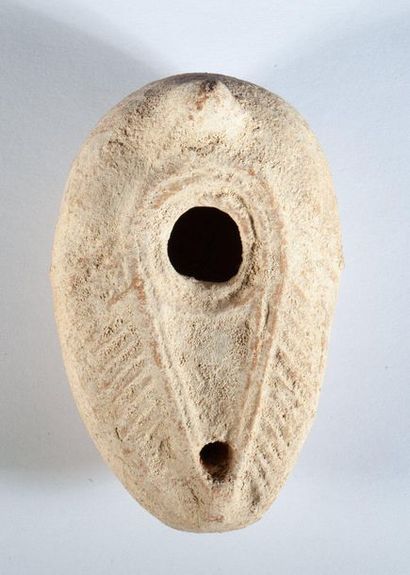 Beige terracotta oil lamp from the Romano-Byzantine...