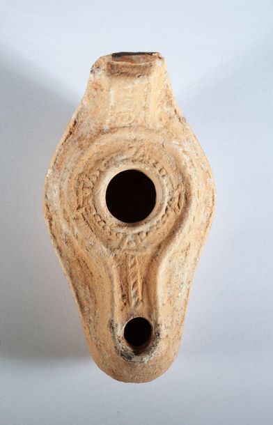 Beige terracotta oil lamp from the Syro-Palestinian...
