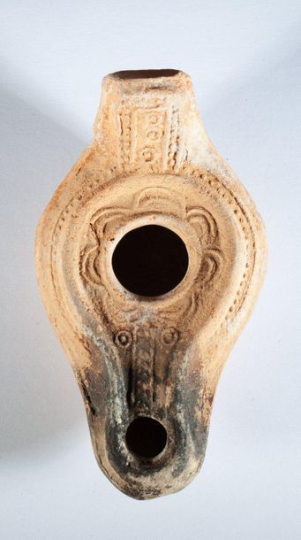 Beige terracotta oil lamp from the Syro-Palestinian...