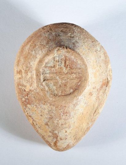 Beige terracotta oil lamp from the Syro-Palestinian...