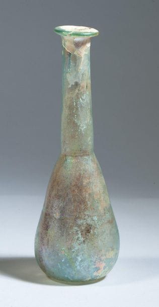 Piriform balsamaire in well iridescent glass.

Roman...