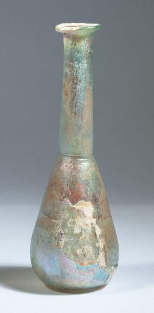 Piriform balsamaire in well iridescent glass.

Roman...