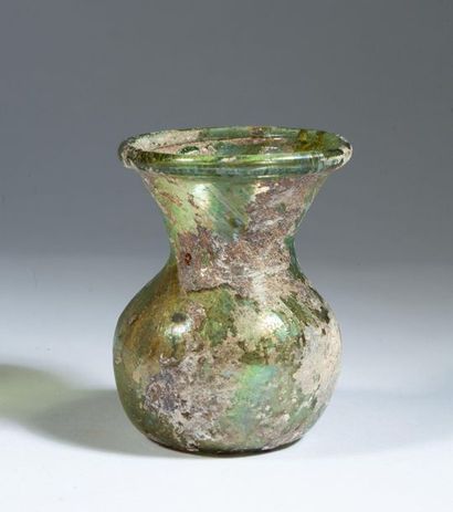 Iridescent glass vase with flared neck. 

Roman...