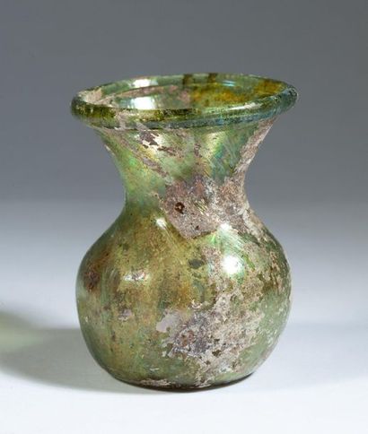Iridescent glass vase with flared neck. 

Roman...