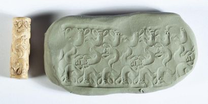 Rare beige stone cylinder seal decorated...