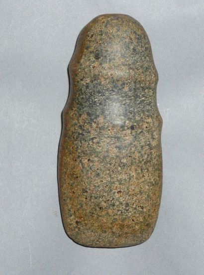 Throat axe made of green/grey speckled stone...