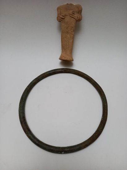 LOT comprising a bronze torque with a green...