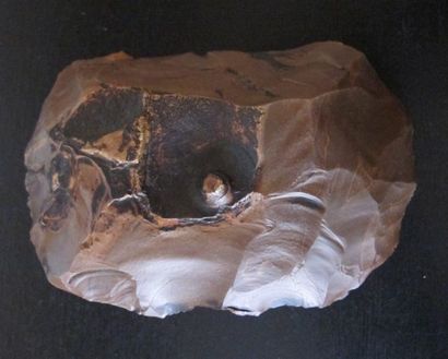 Predynastic axe. Chocolate-patinated silex....