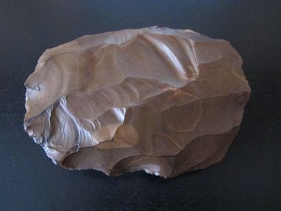 Predynastic axe. Chocolate-patinated silex....