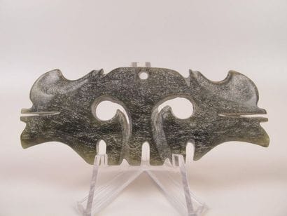 Toothed mask pendant. Jade nephrite.

China....