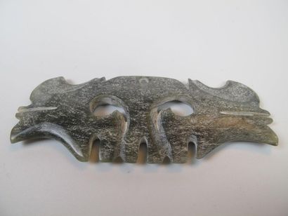 Toothed mask pendant. Jade nephrite.

China....