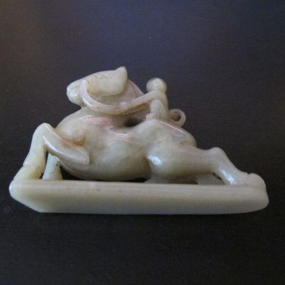 Riding monkey. Celadon nephrite jade. Traditional...