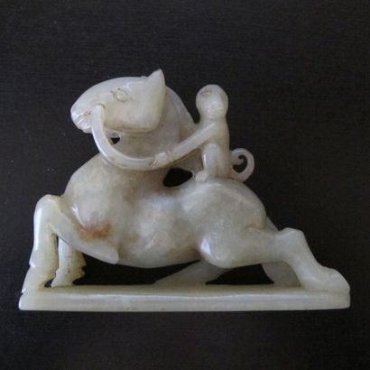 Riding monkey. Celadon nephrite jade. Traditional...