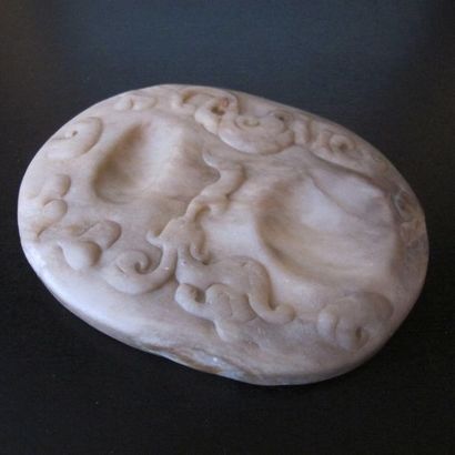Ink stone. Translucent marbled hard stone...