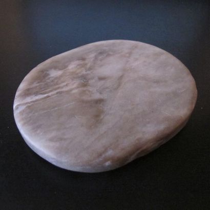 Ink stone. Translucent marbled hard stone...