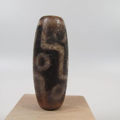 Nine-eyed Dzi pearl, protective talisman....