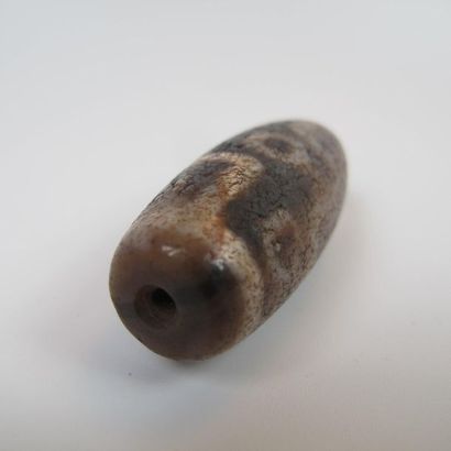 Nine-eyed Dzi pearl, protective talisman....