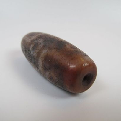Nine-eyed Dzi pearl, protective talisman....