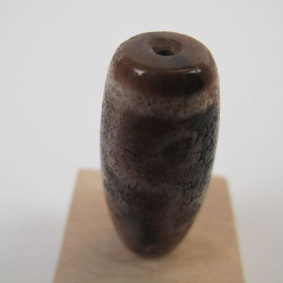 Nine-eyed Dzi pearl, protective talisman....