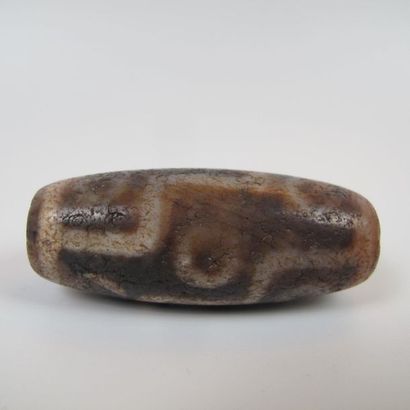 Nine-eyed Dzi pearl, protective talisman....