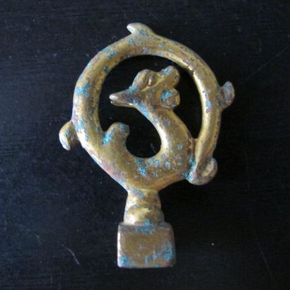 Small square stamp, the catch formed by a...