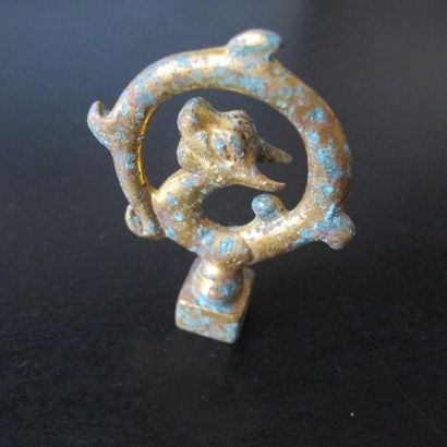 Small square stamp, the catch formed by a...