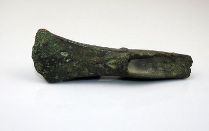 Axe with heel with emblem decoration at the...