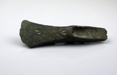 Axe with heel with emblem decoration at the...